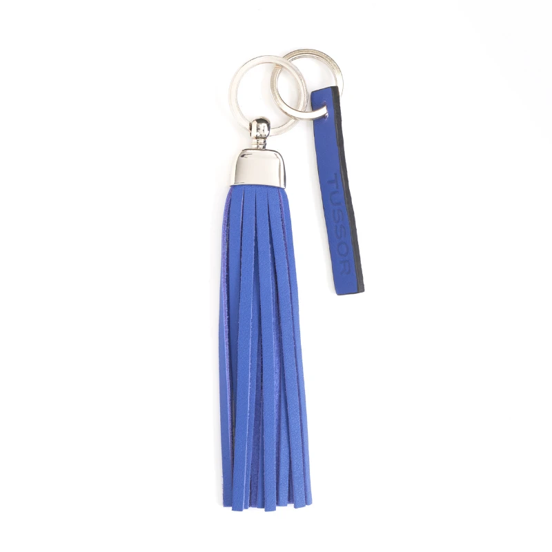 porte-clés pompon en cuir bleu cobalt