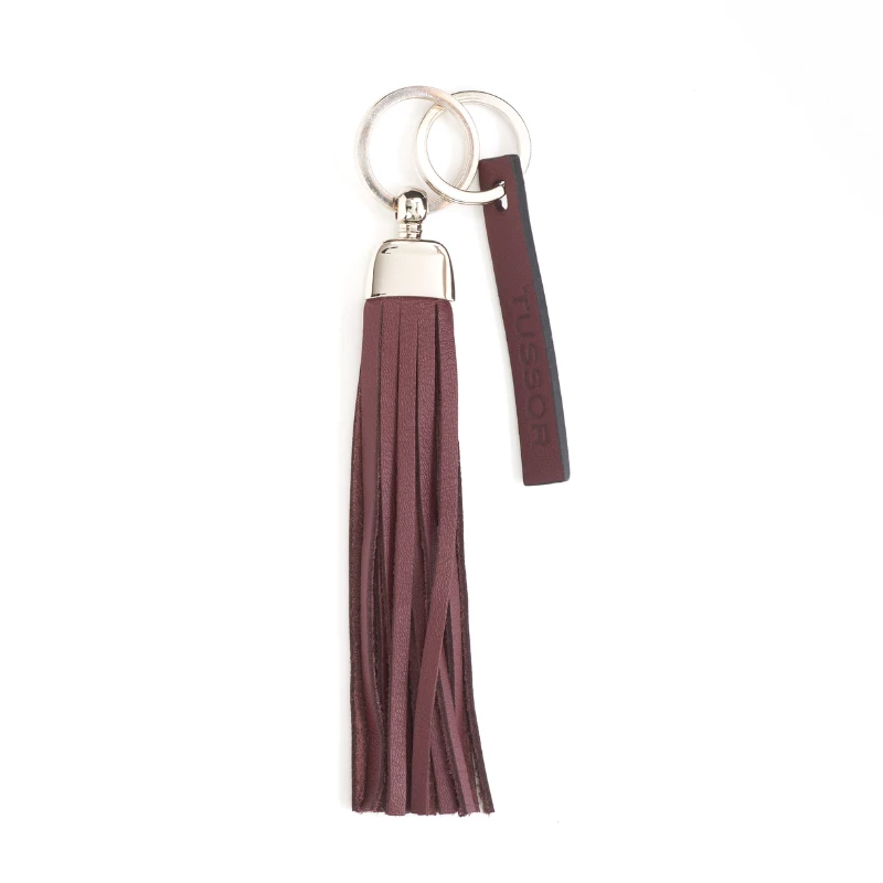 porte-clés pompon en cuir bordeaux foncée