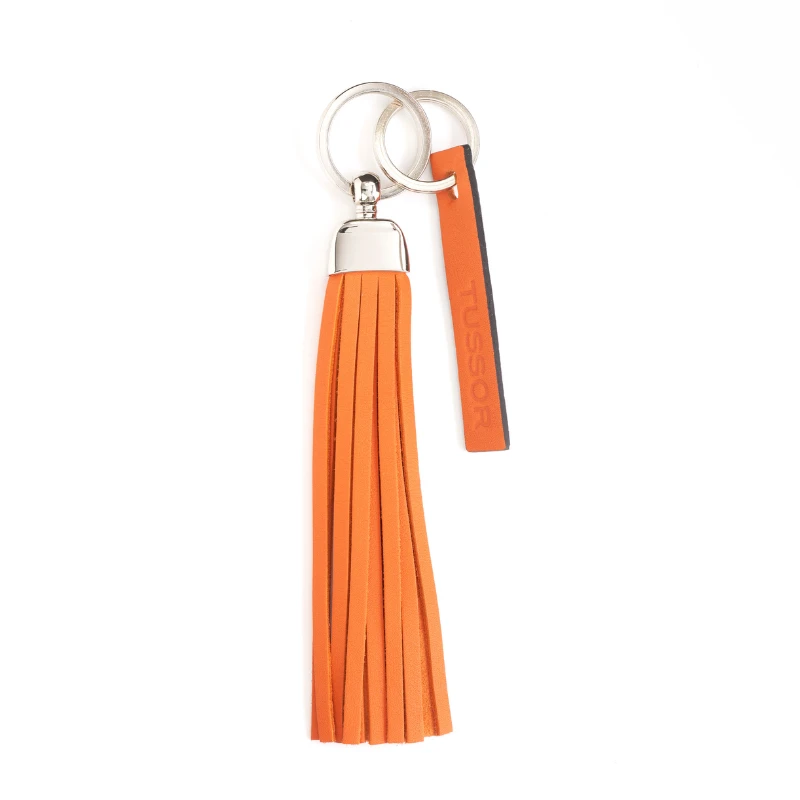 porte-clés pompon en cuir mandarine