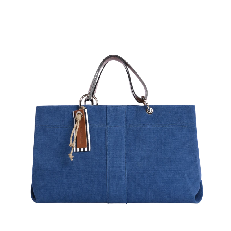 sac de ville modulable en coton bleu roi avec des anses en cuir naturel