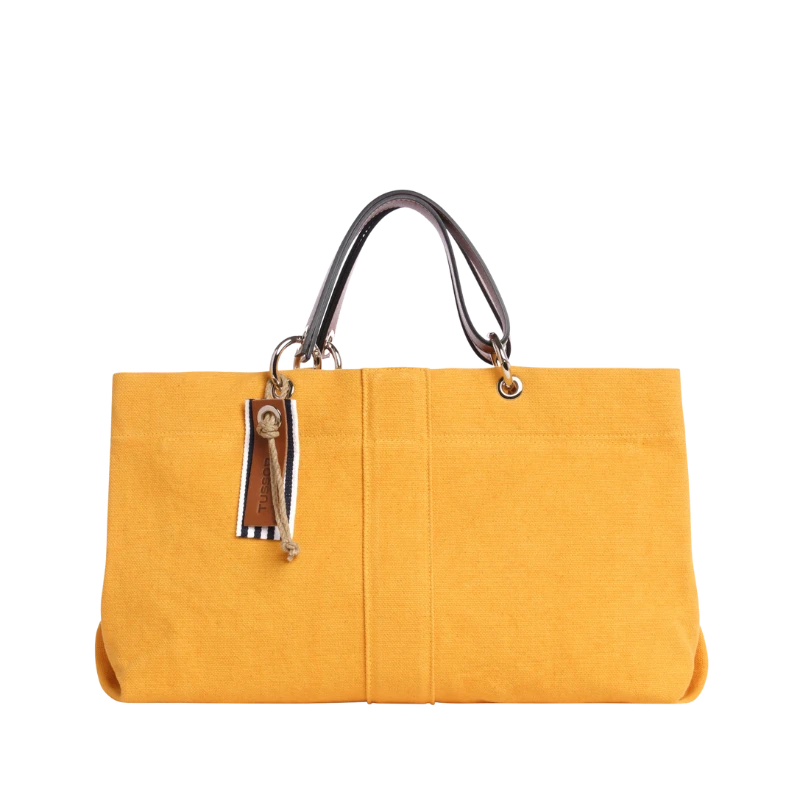 sac de ville modulable en coton jaune avec des anses en cuir naturel