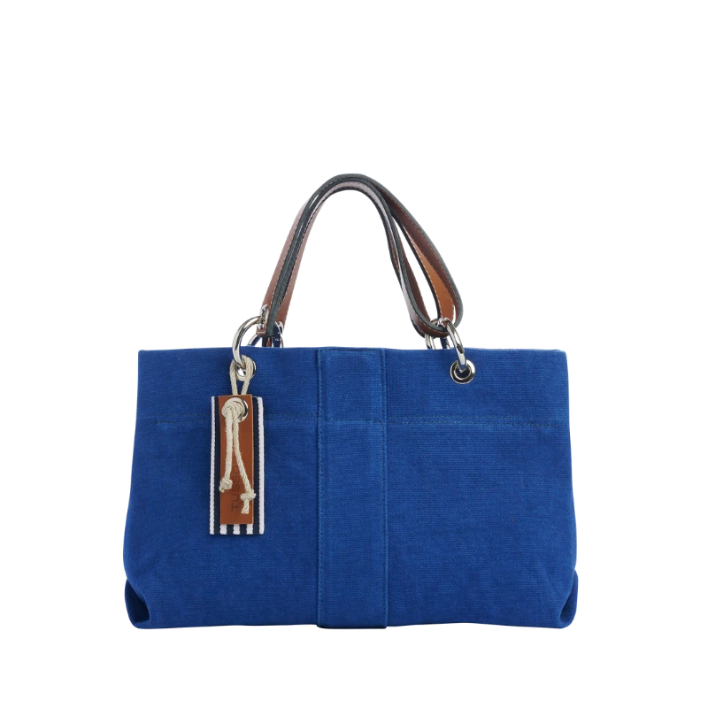 sac de ville modulable en coton bleu roi avec des anses en cuir naturel