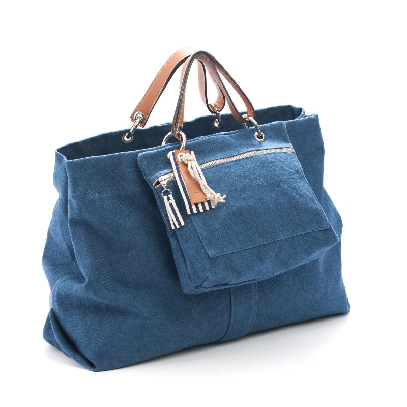 sac modulable en coton bleu canard, pour le week-end, avec des anses en cuir naturel et sa pochette equipier en coton bleu canard