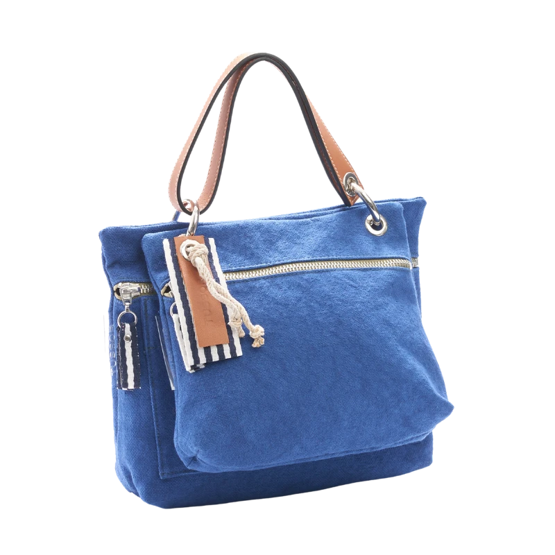 pochette yole en coton bleu roi accrochee sur un equipier bleu roi avec une anse canotage en cuir gold