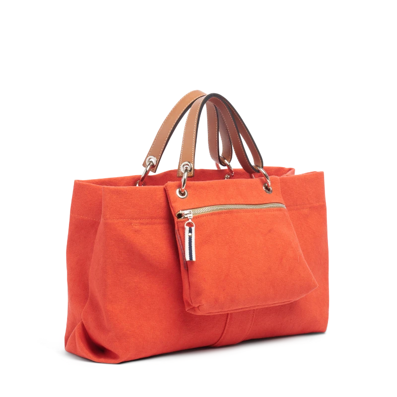 pochette yole en coton corail accrochee à un sac canotage medium corail