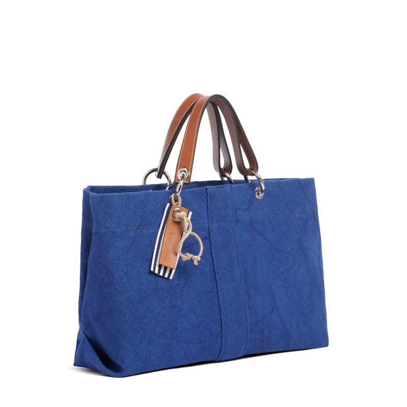 sac de ville modulable en coton bleu roi avec des anses en cuir naturel