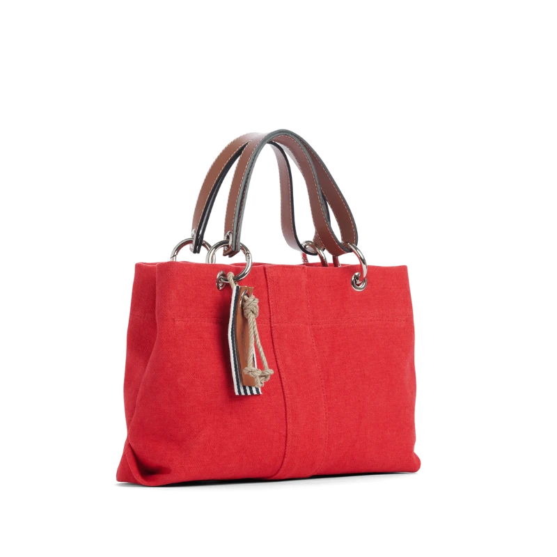 sac de ville modulable en coton rouge avec des anses en cuir naturel