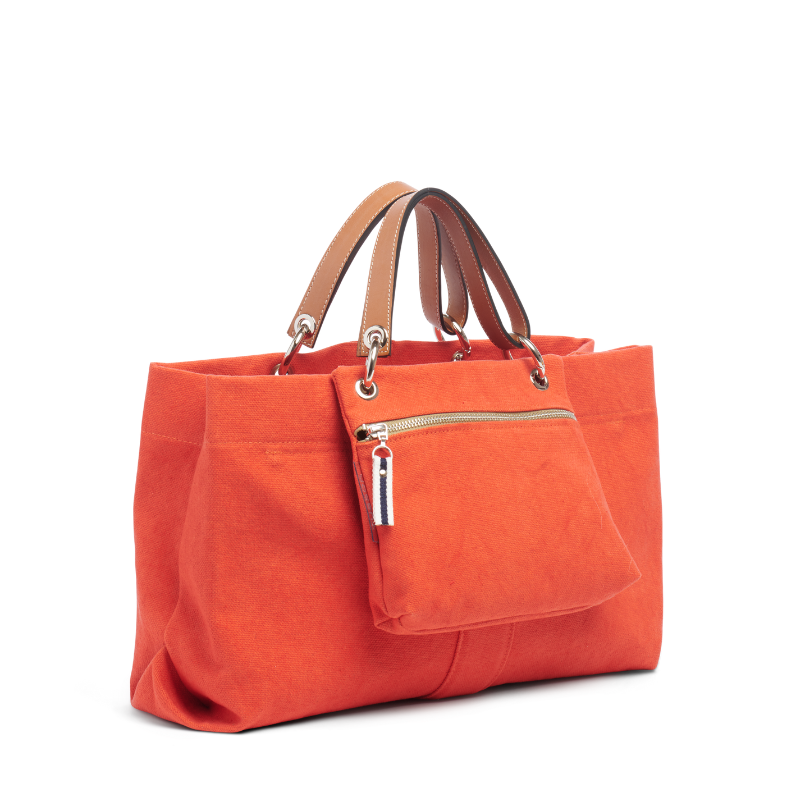 pochette yole en coton corail accrochee à un sac canotage medium corail