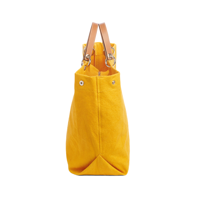 grand sac modulable en coton jaune, pour le week-end, avec des anses en cuir naturel