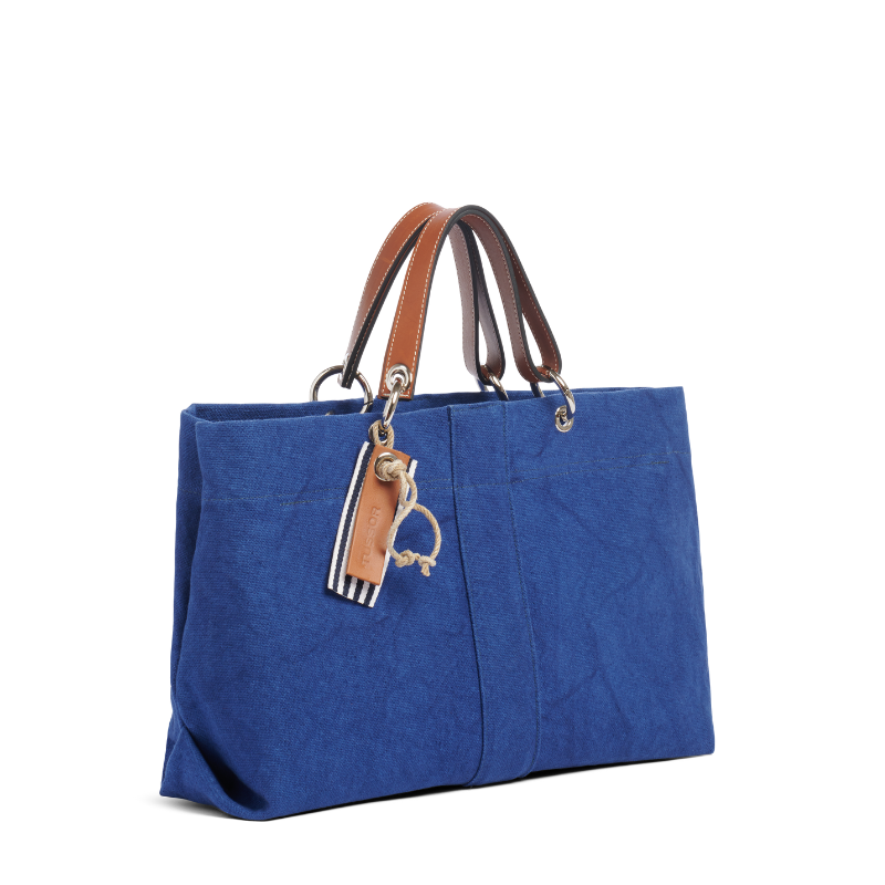 sac de ville modulable en coton bleu roi avec des anses en cuir naturel