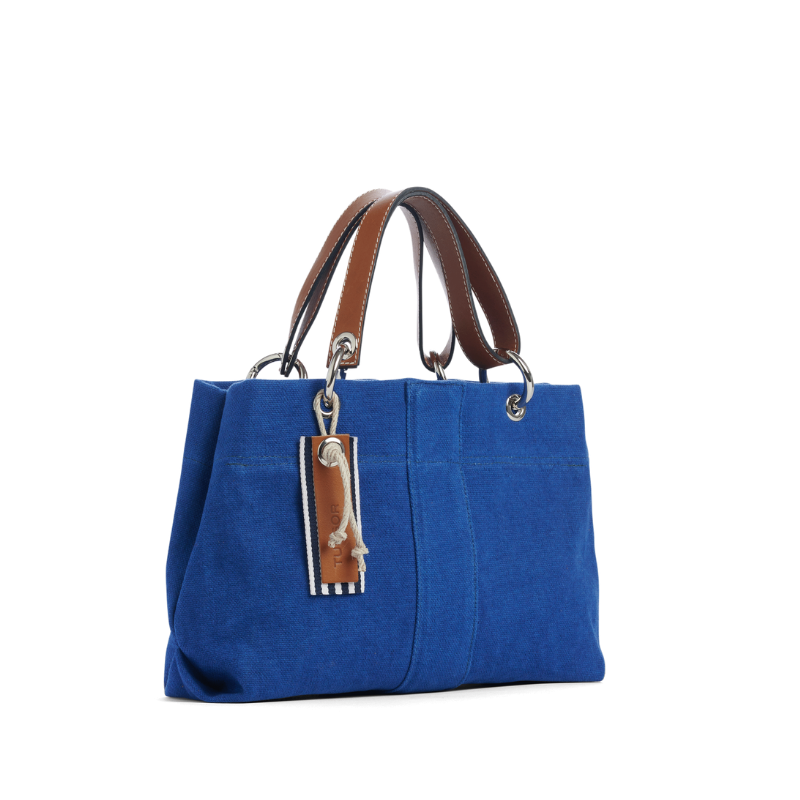 sac de ville modulable en coton bleu roi avec des anses en cuir naturel