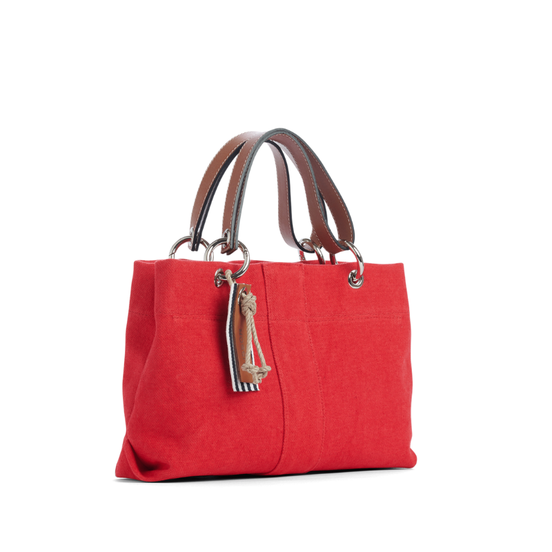 sac de ville modulable en coton rouge avec des anses en cuir naturel